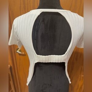 Isalis Ribbed top curved hem cut out back size medium